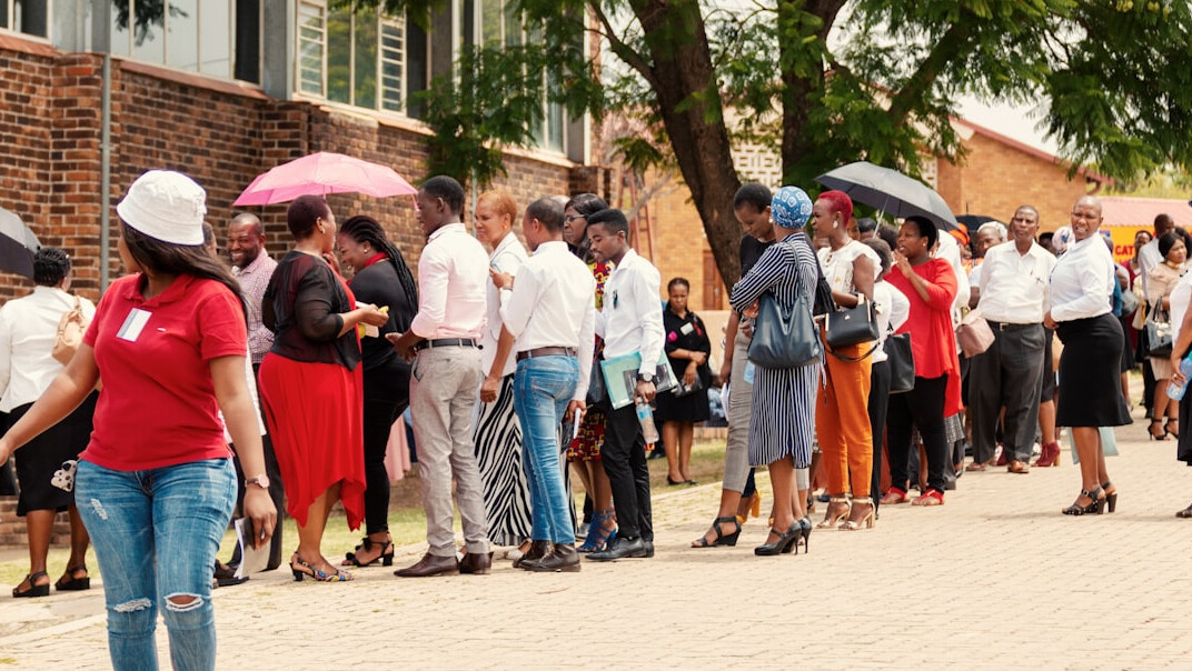 Attendees networking during a break at a leadership forum